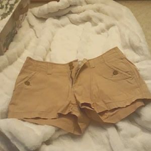 Tan mid-rise Old Navy Shorts. Size 8